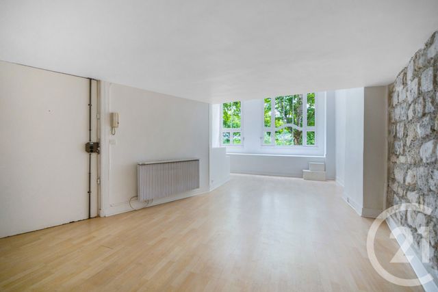 Afficher la photo en grand Appartement Atelier d'artiste à vendre - 2 pièces - 54.25 m2 - PARIS - 75014 - ILE-DE-FRANCE - Century 21 Côté Mairie