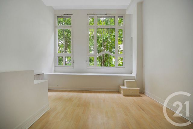 Afficher la photo en grand Appartement Atelier d'artiste à vendre - 2 pièces - 54.25 m2 - PARIS - 75014 - ILE-DE-FRANCE - Century 21 Côté Mairie